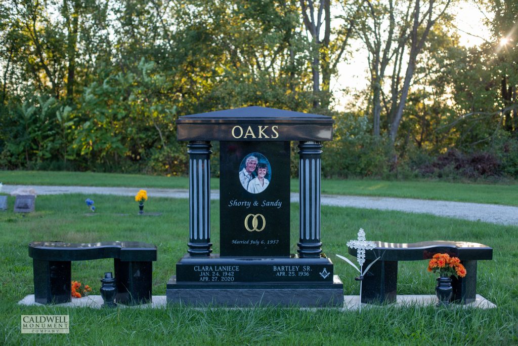 Companion-memorial-Multiple-Granite-pieces-Benches-Sub-base-2"-margin-Gold-leaf-pillar-cap-curved-bench-greenlawn-cemetery-mexico-oaks-tablet-memorials-for-2-picture-rings